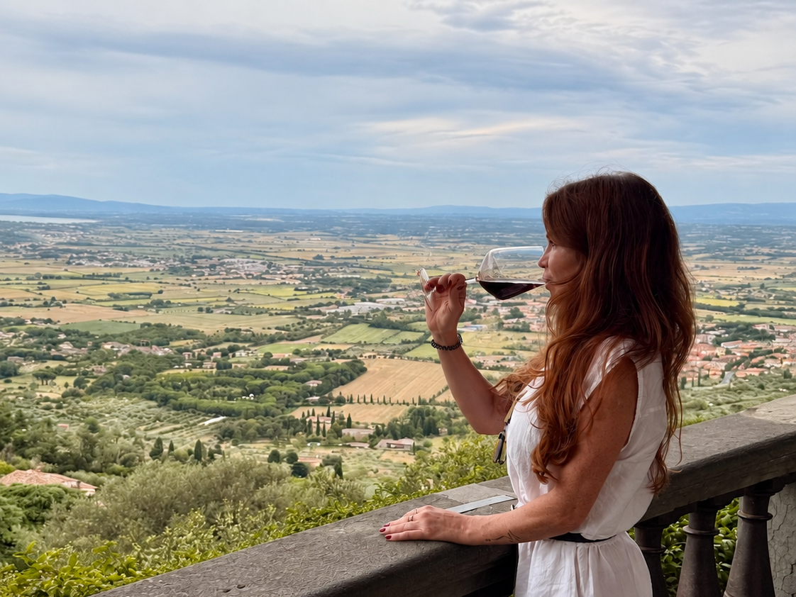 Natalie sipping wine in Cortona